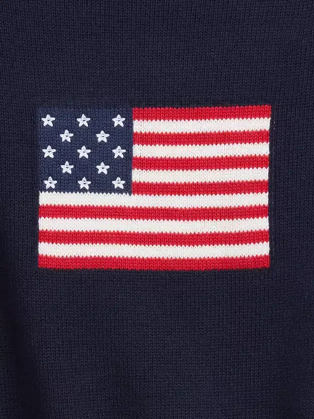 Oversized heklet genser for barn med amerikansk motiv