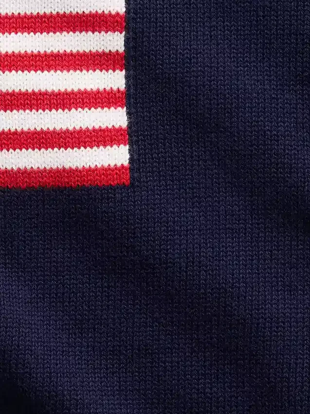 Oversized heklet genser for barn med amerikansk motiv