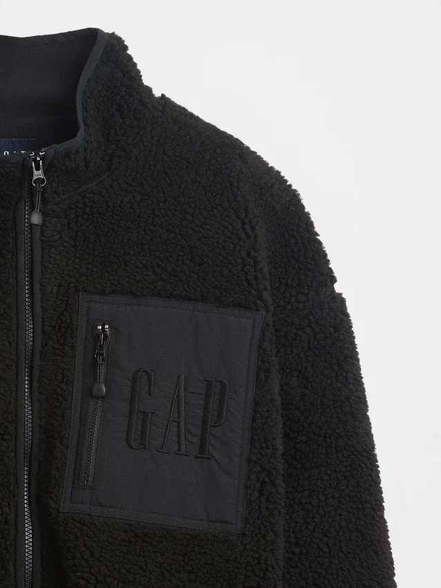 Oversized logo-jakke med glidelås i resirkulert sherpa