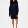 Oversized minigenser i strikk med høyhals