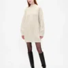 Oversized minigenser i strikk med høyhals