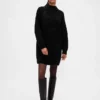 Oversized minigenser i strikk med høyhals