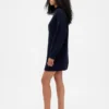 Oversized minigenser i strikk med høyhals