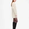 Oversized minigenser i strikk med høyhals