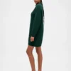 Oversized minigenser i strikk med høyhals