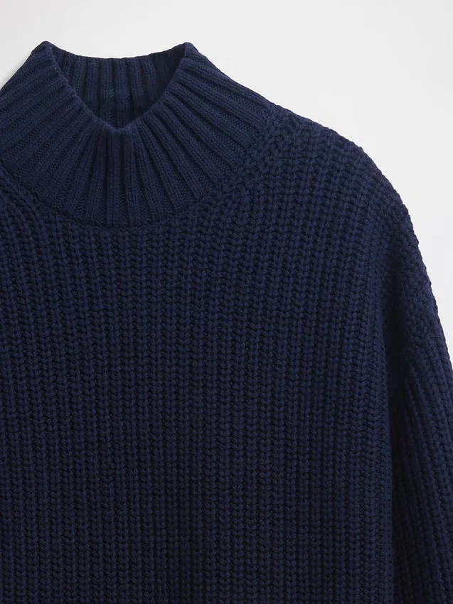 Oversized minigenser i strikk med høyhals