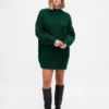 Oversized minigenser i strikk med høyhals