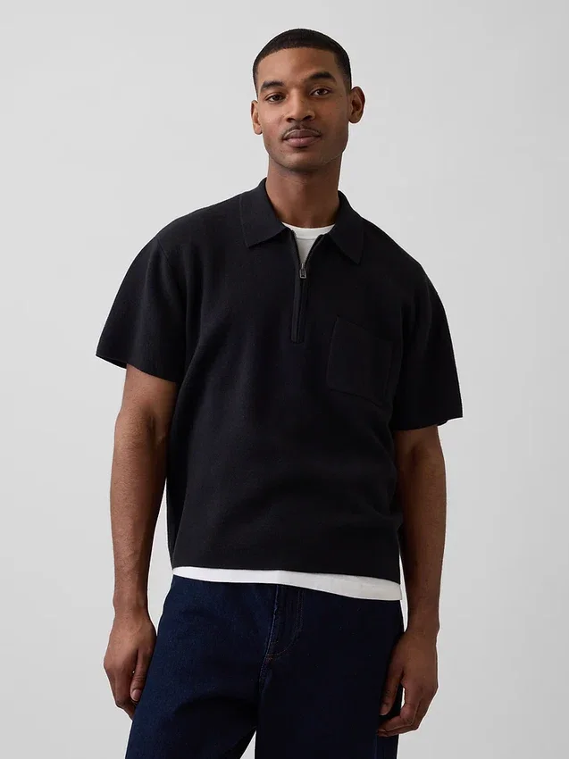 Oversized polo-genser med kvart glidelås og lomme