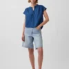 Oversized topp i bomullsgasbind-denim med splitt i halsen