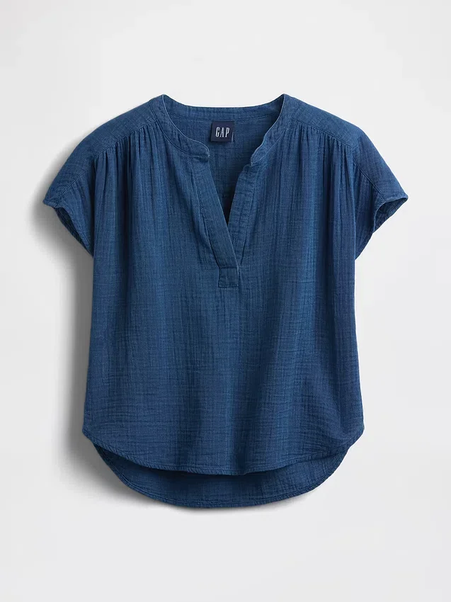 Oversized topp i bomullsgasbind-denim med splitt i halsen
