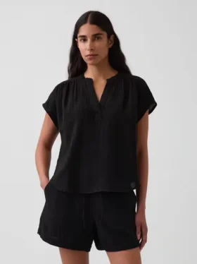 Oversized topp i bomullsgasbind med splitt i halsen