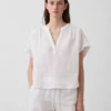 Oversized topp i bomullsgasbind med splitt i halsen
