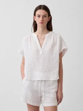 Oversized topp i bomullsgasbind med splitt i halsen