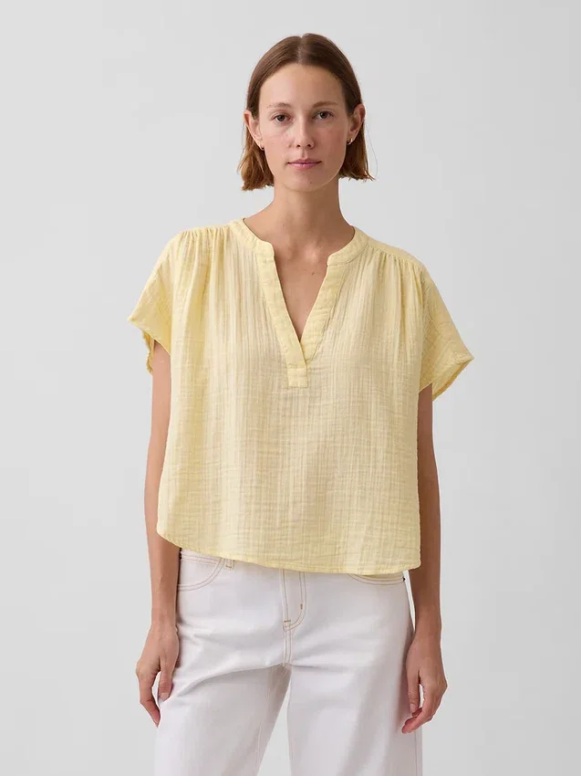 Oversized topp i bomullsgasbind med splitt i halsen