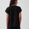 Oversized topp i bomullsgasbind med splitt i halsen