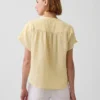Oversized topp i bomullsgasbind med splitt i halsen