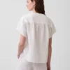 Oversized topp i bomullsgasbind med splitt i halsen