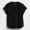 Oversized topp i bomullsgasbind med splitt i halsen