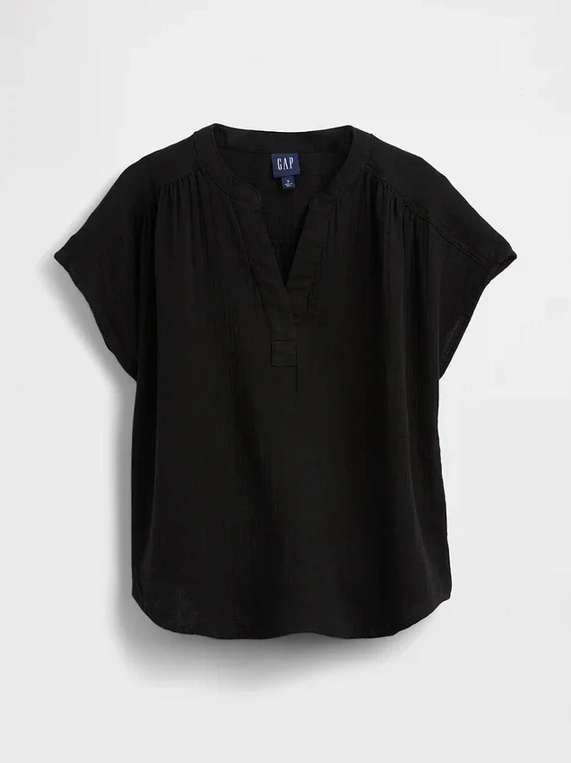 Oversized topp i bomullsgasbind med splitt i halsen