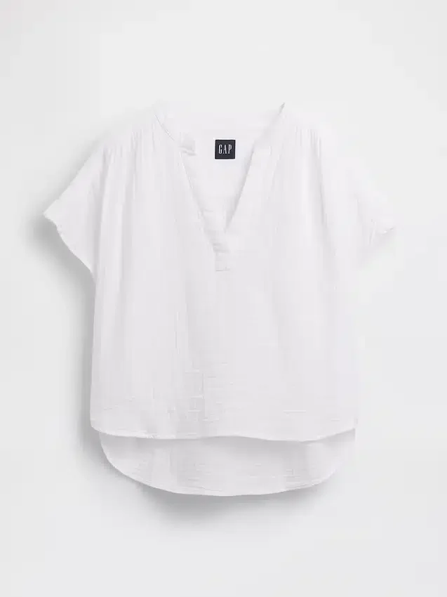Oversized topp i bomullsgasbind med splitt i halsen
