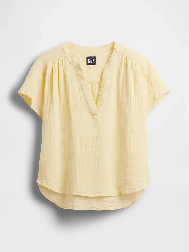 Oversized topp i bomullsgasbind med splitt i halsen
