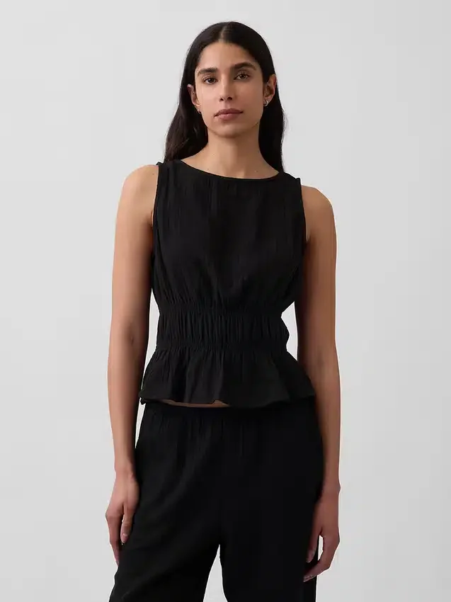 Peplum-top i bomullsgasbind med smock i midjen