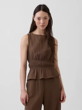 Peplum-top i bomullsgasbind med smock i midjen