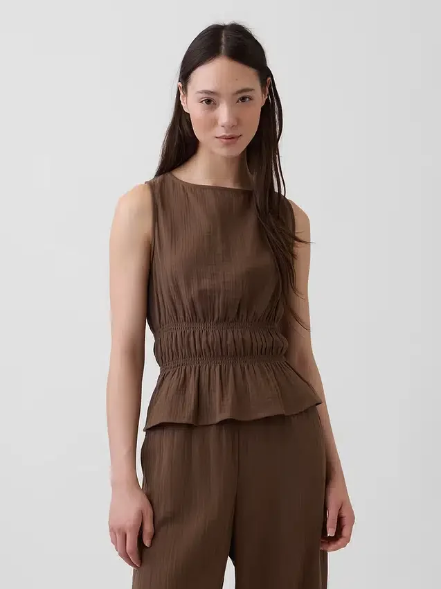 Peplum-top i bomullsgasbind med smock i midjen