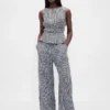 Peplum-top i bomullsgasbind med smock i midjen