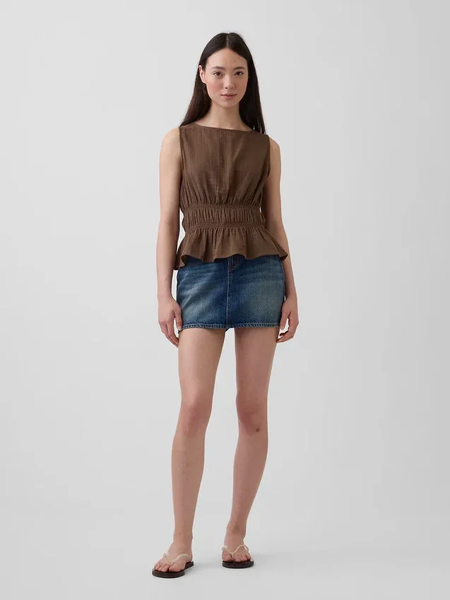 Peplum-top i bomullsgasbind med smock i midjen
