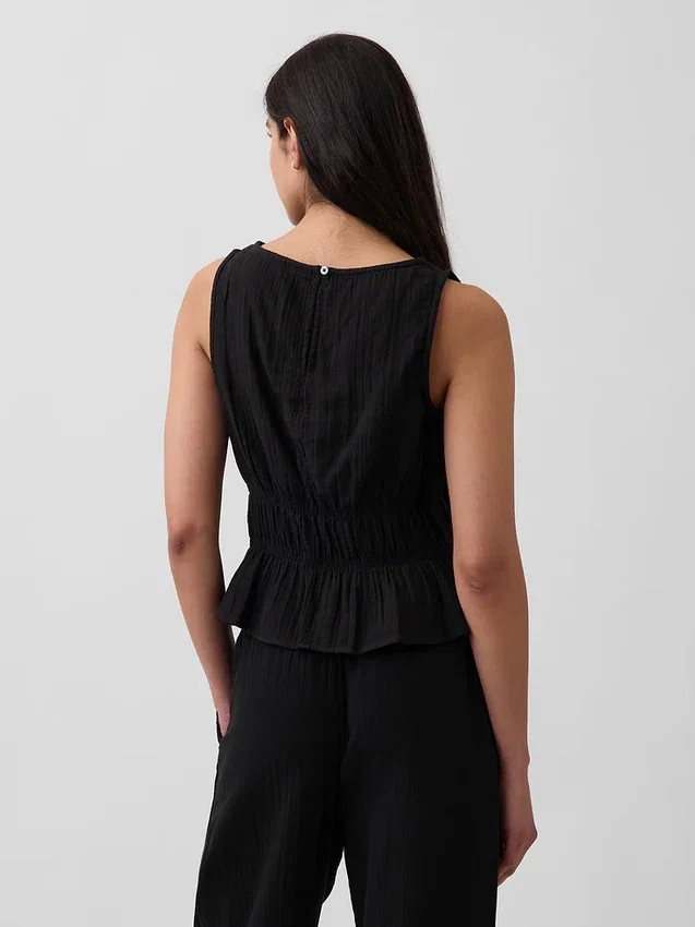 Peplum-top i bomullsgasbind med smock i midjen