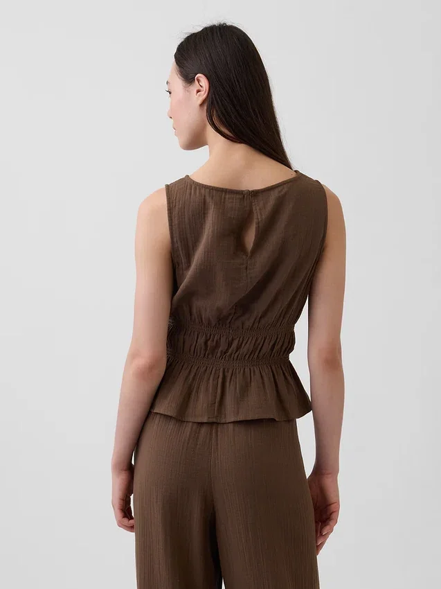 Peplum-top i bomullsgasbind med smock i midjen