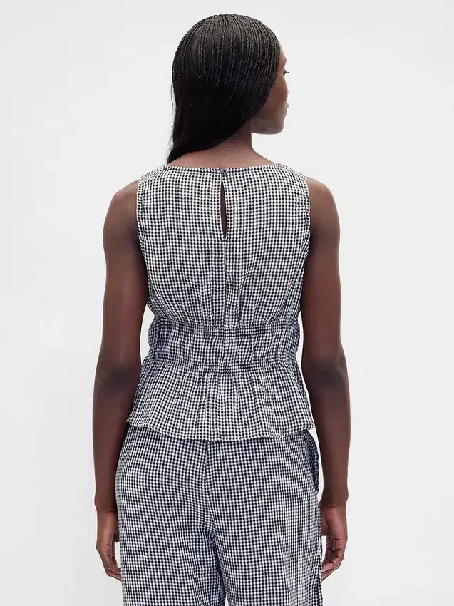 Peplum-top i bomullsgasbind med smock i midjen