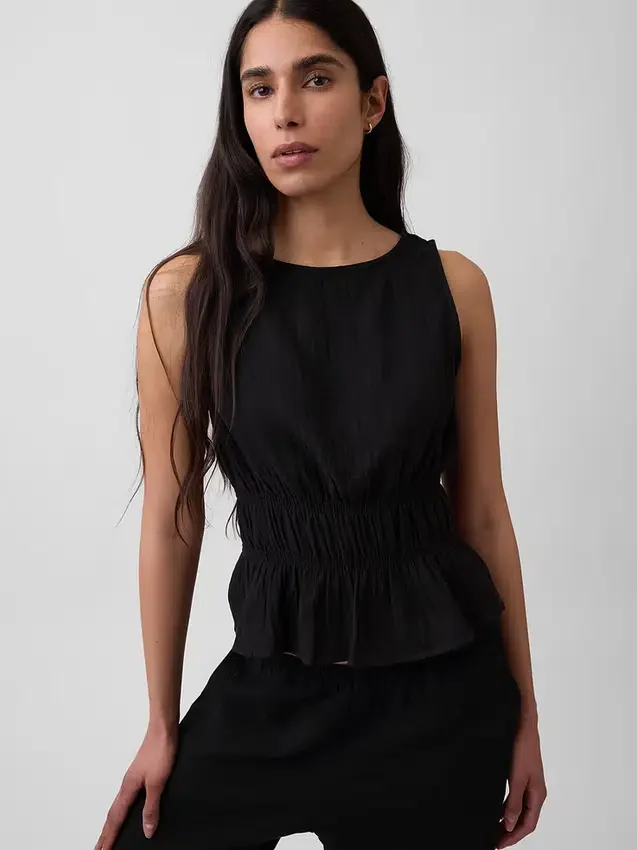 Peplum-top i bomullsgasbind med smock i midjen