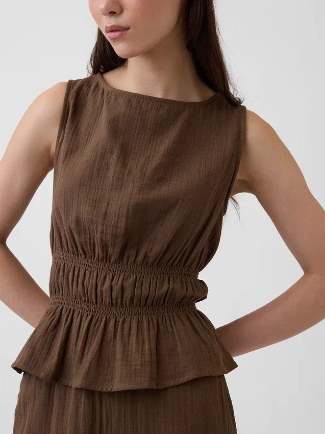 Peplum-top i bomullsgasbind med smock i midjen