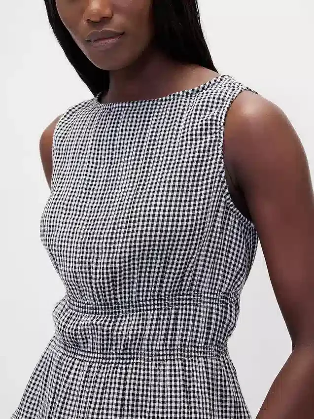 Peplum-top i bomullsgasbind med smock i midjen