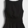 Peplum-top i bomullsgasbind med smock i midjen