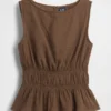 Peplum-top i bomullsgasbind med smock i midjen