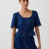 Peplum-top med blonderkant