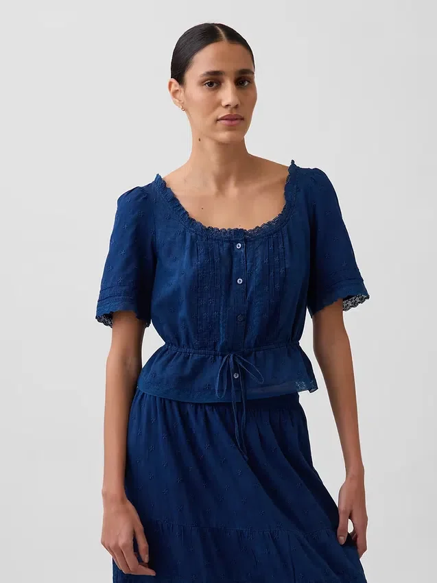 Peplum-top med blonderkant
