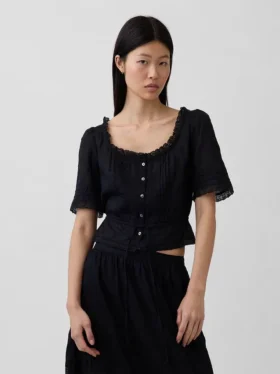 Peplum-top med blonderkant