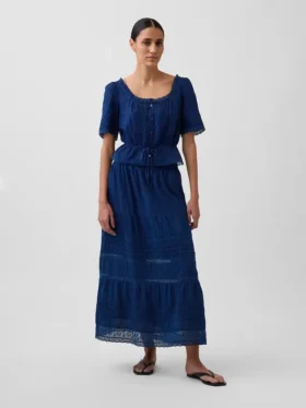 Peplum-top med blonderkant