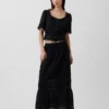 Peplum-top med blonderkant