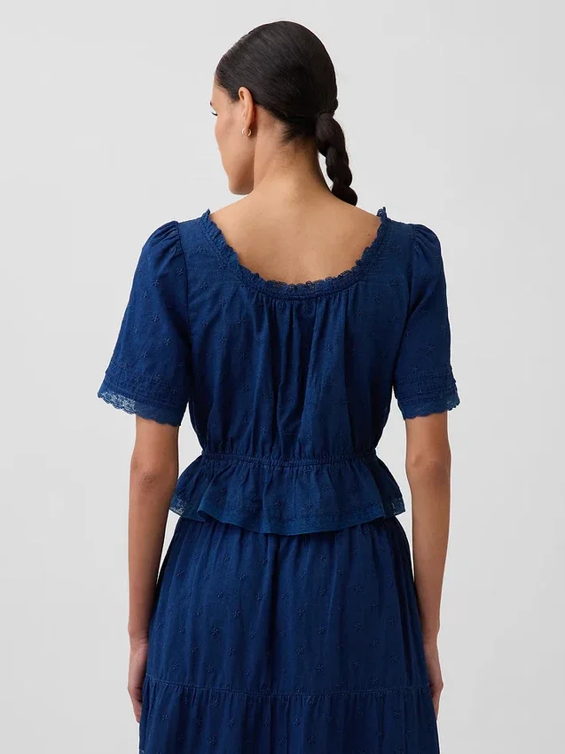 Peplum-top med blonderkant