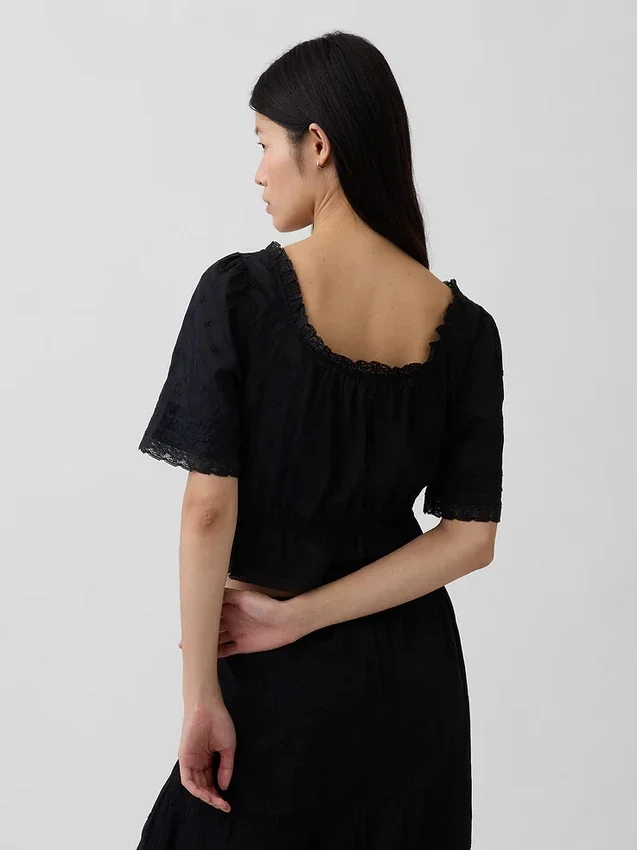 Peplum-top med blonderkant