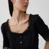 Peplum-top med blonderkant