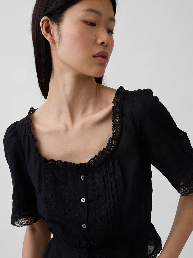Peplum-top med blonderkant