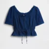 Peplum-top med blonderkant