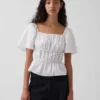 Peplum-top med firkantet hals