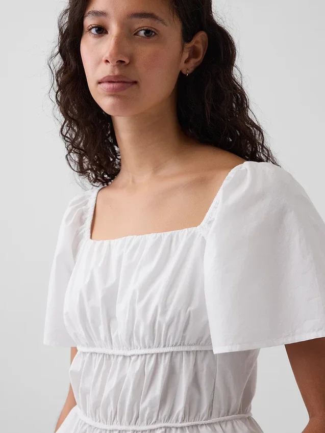 Peplum-top med firkantet hals